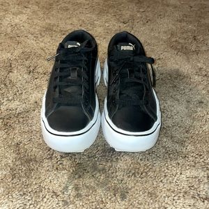Black platform Puma sneakers